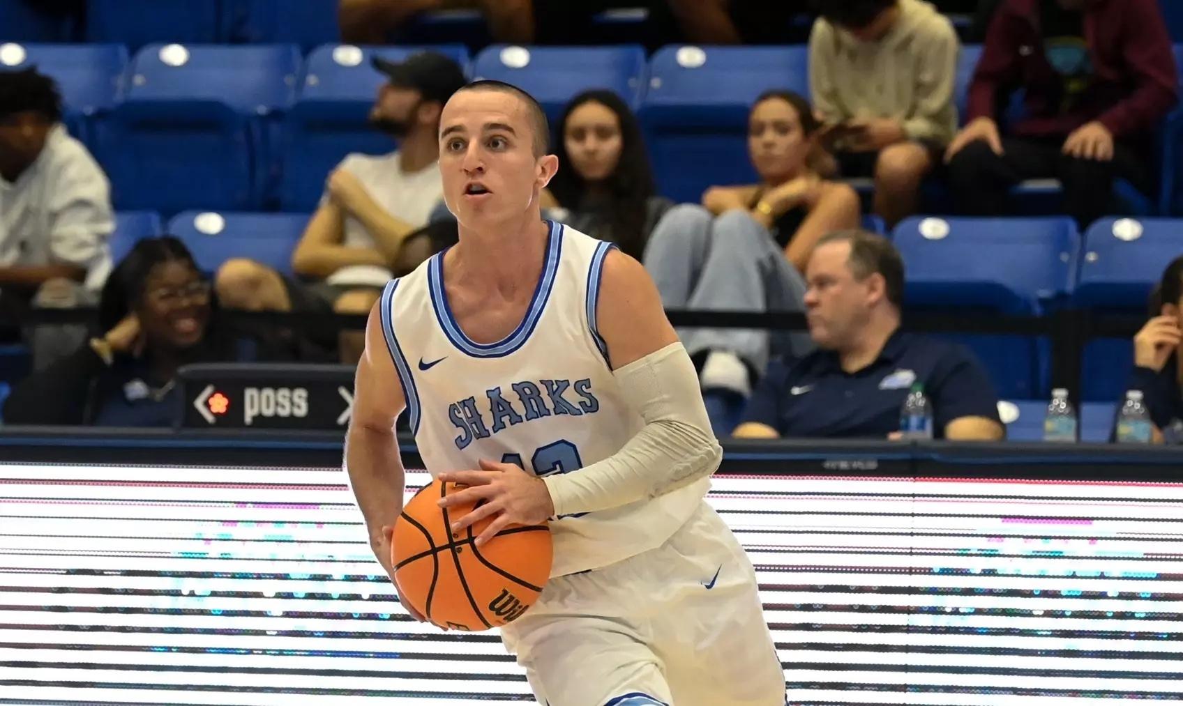 Dallas Graziana drives to the hoop.s