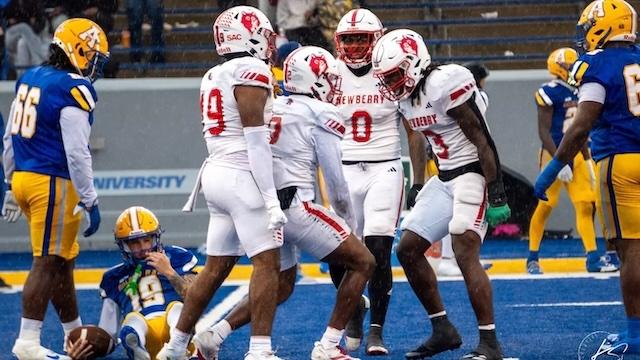 Newberry celebrates advancing to its first-ever DII football semifinals. 